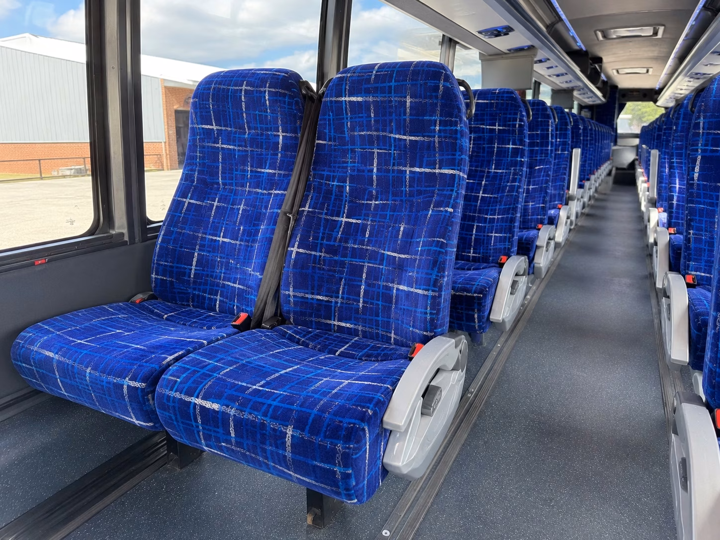 clinton township bus rentals to dtw for wedding guests
