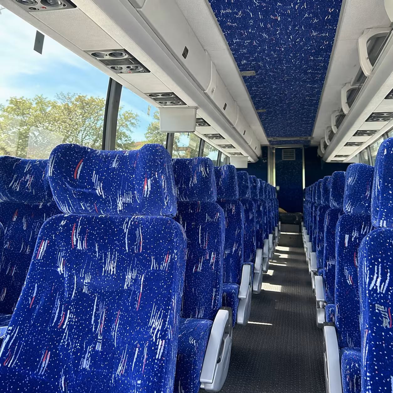 clinton township charter buses to michigan and michigan state games